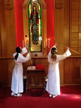 Blondia and Merrill lighting Columbarium candles Blondia and Merrill lighting Columbarium candles